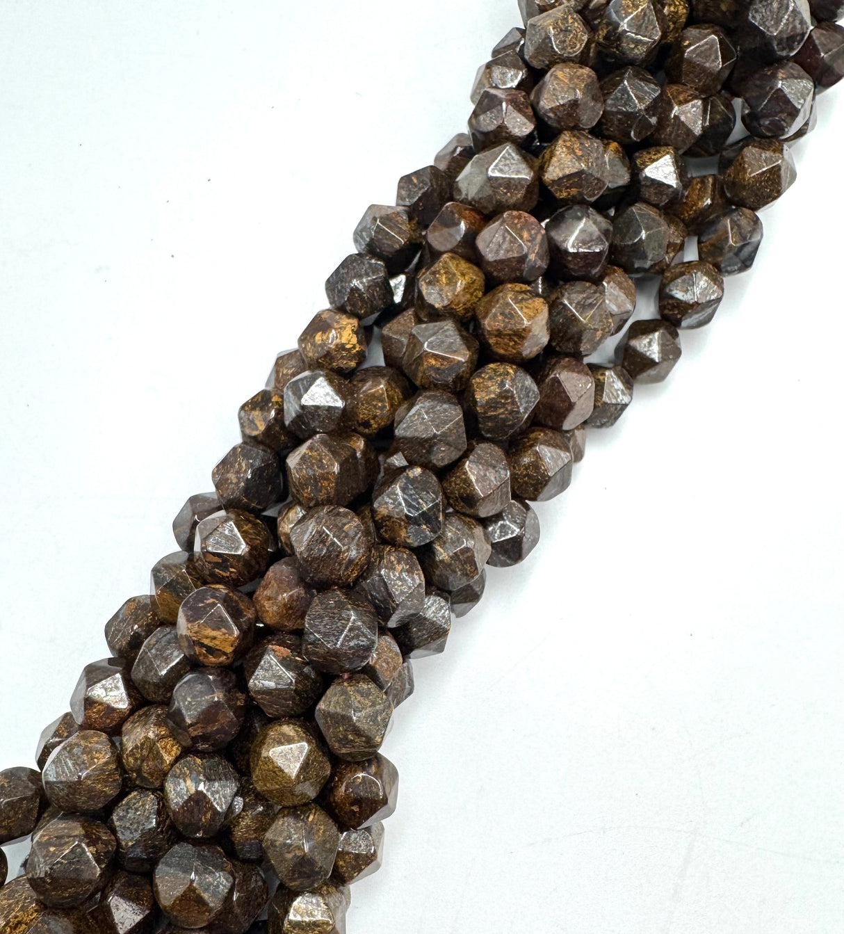 Bronzit Perlen – Sternschliff (10mm)