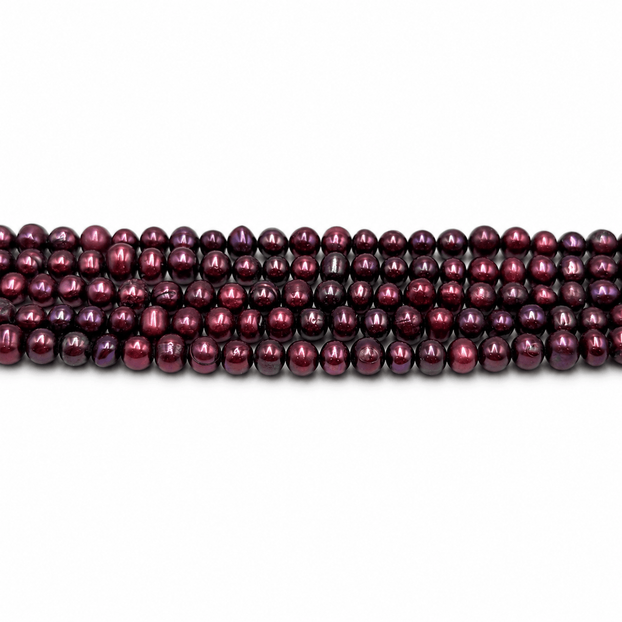 Farvede Ferskvandsperler - Lilla (5-6x5-7mm) - Uniq Perler - 814373