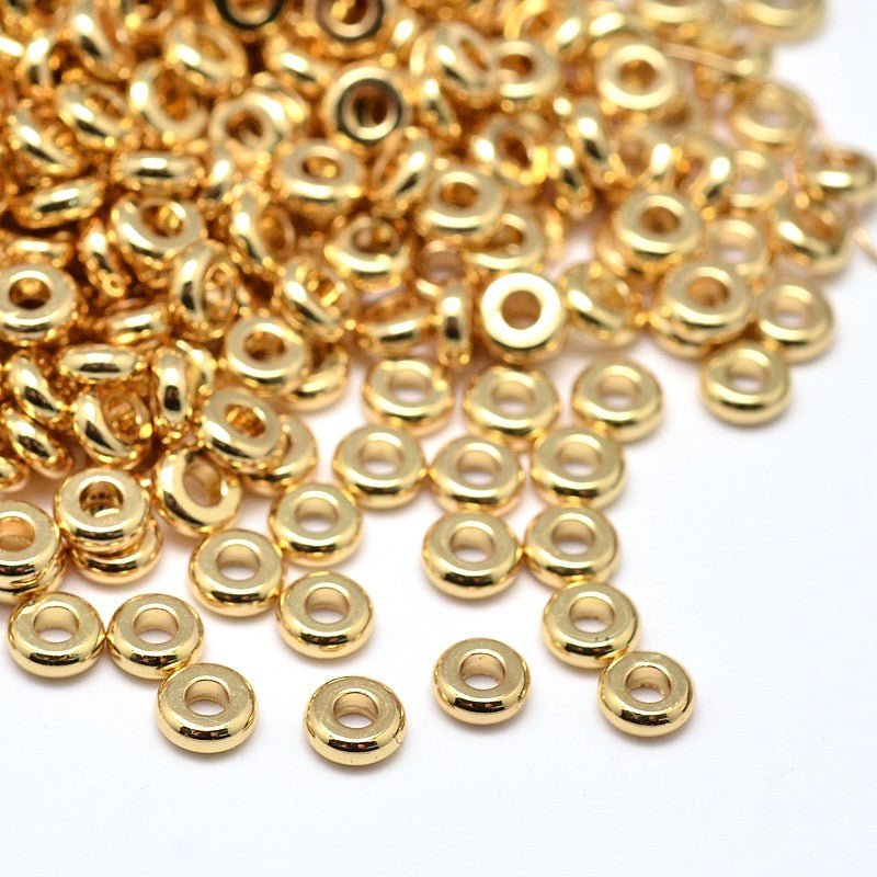 Flat Round Spacer Beads – Brass, Gold-Colored (4mm) 10 pcs. - Uniq Perler - 116986