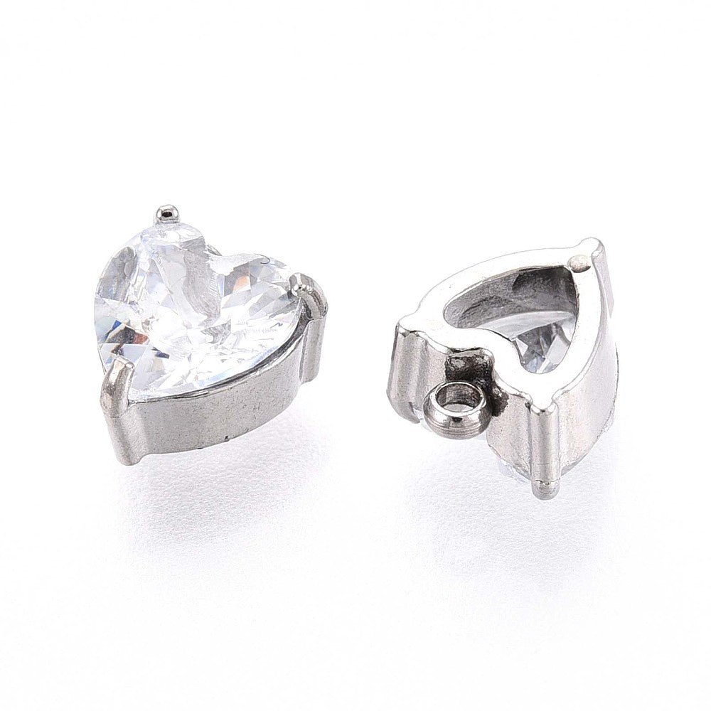 Glashjerte Vedhæng – Facetteret, Vandfast stål (8x6mm, Klar/Stål)2 stk. - Uniq Perler -