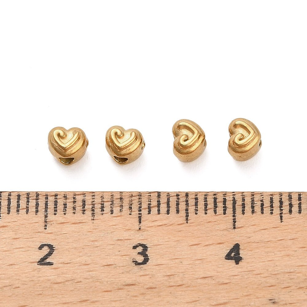 Hjerte Perler i Forgyldt Stål – (3,5x4x4,5mm, 6 stk) - Uniq Perler -