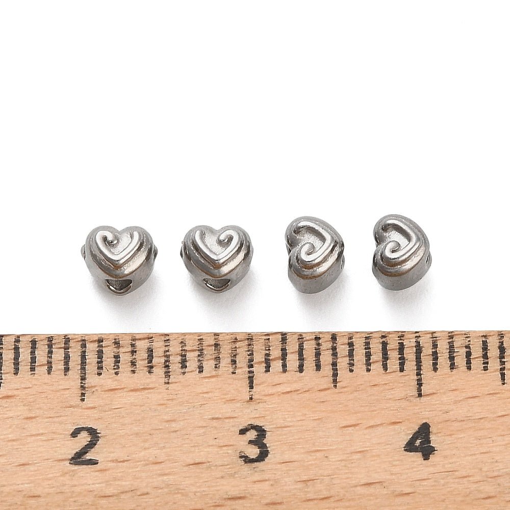 Hjerte Perler i Stål – (3,5x4x4,5mm, 6 stk) - Uniq Perler -
