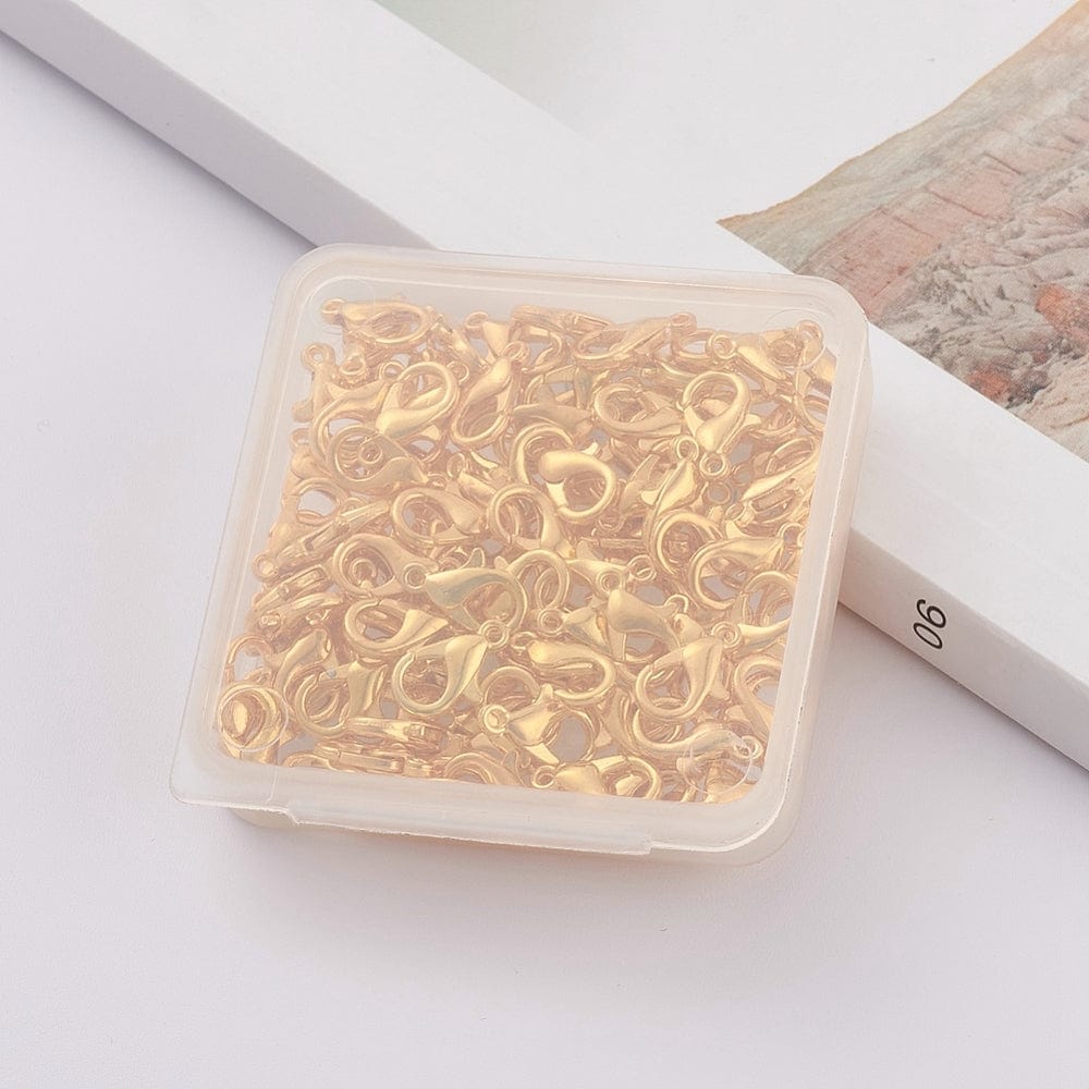 Karabin Låse – 18K Forgyldt (12x6mm), 100 Stk - Uniq Perler - 567848