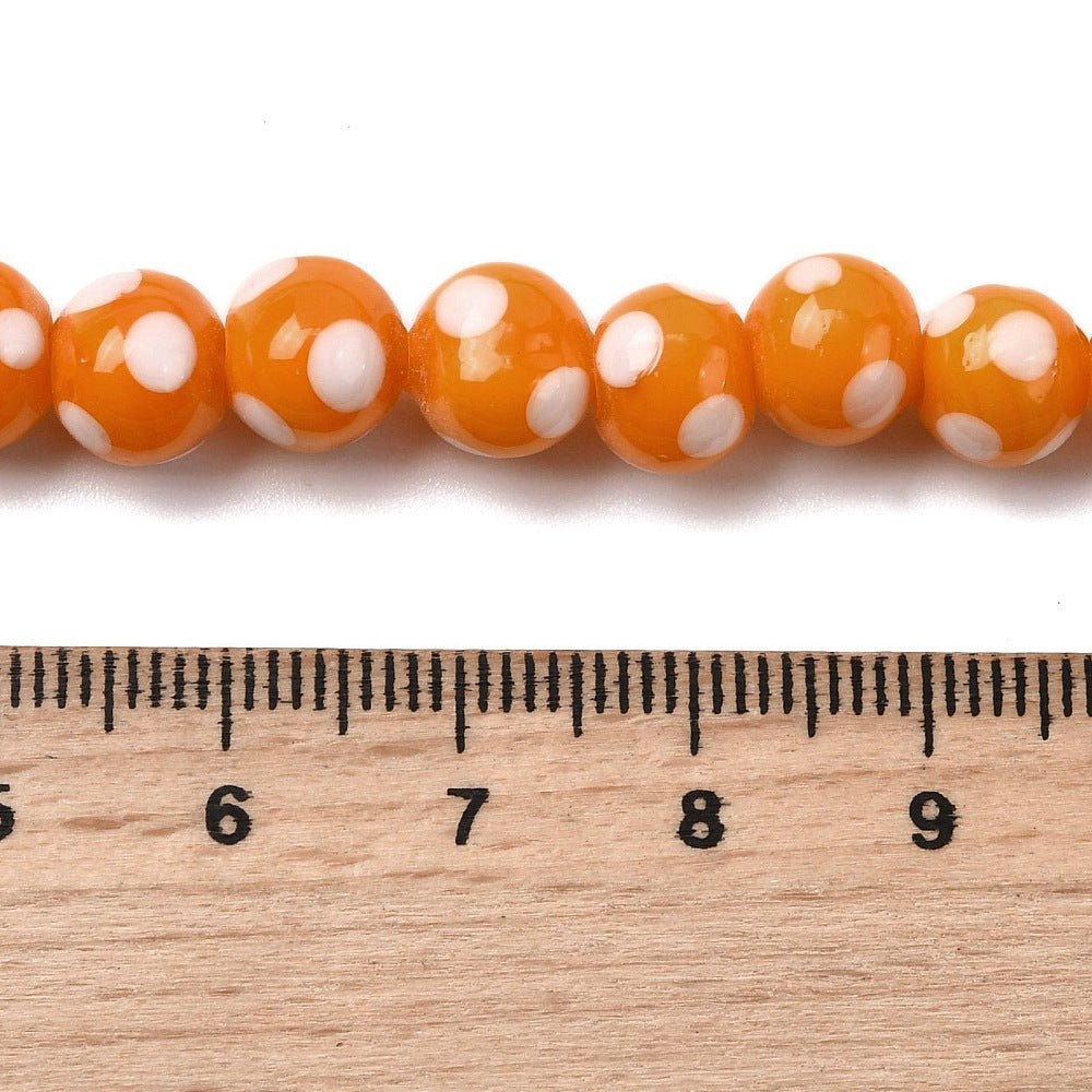 Lampwork Glasperler – Orange Med Prikker, Runde (8x7mm) 8 stk. - Uniq Perler - 122701