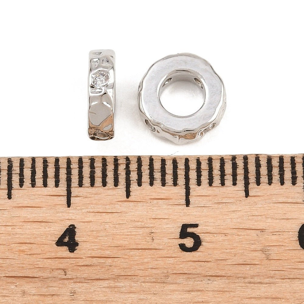 Mellemleds Perler Med Zirkonia – Langtidsholdbar Platinbelagt Messing (7,5x2,3mm) 2 stk. - Uniq Perler - 122496
