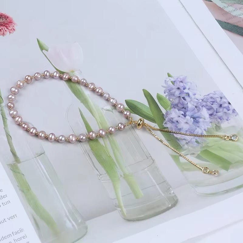 Regulerbar Armbånd med Ferskvandsperler, rosa Nuancer - Uniq Perler - 514433