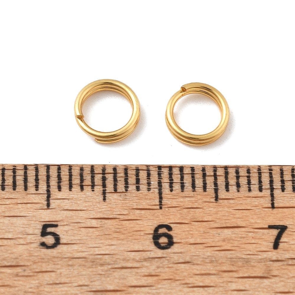 Splitringe i Vandfast Stål – 18K Forgyldt (6mm 10 stk) - Uniq Perler - 116028