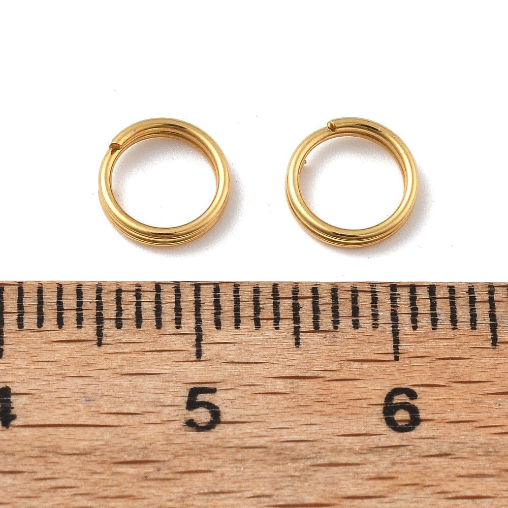 Splitringe i Vandfast Stål – 18K Forgyldt (7mm 10 stk) - Uniq Perler - 116025