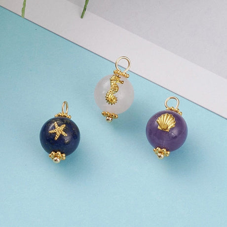 3 stk.vedhæng i natursten med motiver, forgyldt stål.(10,5x17,5x11,5 mm) - Uniq Perler - 152378645670428980012855