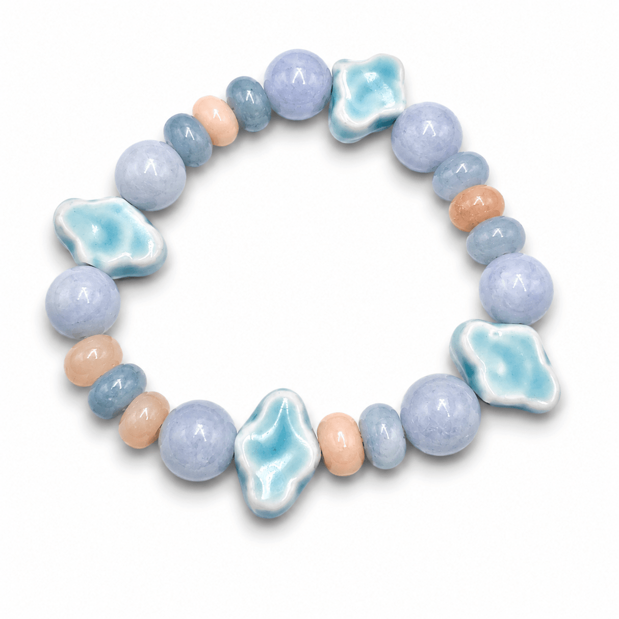 Auktion M.....Porcelænsperler – Glaseret, Lyseblå (10-12x16x6mm) 4 stk. - Uniq Perler - 122764