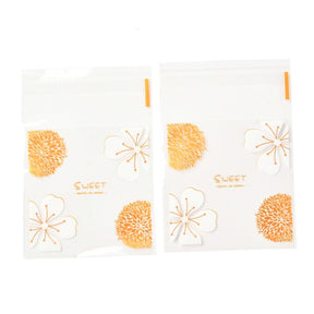 Cellofanpåsar Med Blommor – Gul/Orange (10x7cm) 100 St - Uniq Perler - 115315