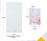 Display til Øreringe og Kæder inkl. Cellofanposer (19x6cm), 50 Stk - Uniq Perler - 111387