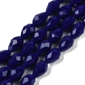 Dråbeformede Glasperler – Opaque Midnatsblå, Facetterede (8x6mm), 51 cm. - Uniq Perler - 125795