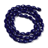 Dråbeformede Glasperler – Opaque Midnatsblå, Facetterede (8x6mm), 51 cm. - Uniq Perler - 125795