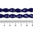 Dråbeformede Glasperler – Opaque Midnatsblå, Facetterede (8x6mm), 51 cm. - Uniq Perler - 125795