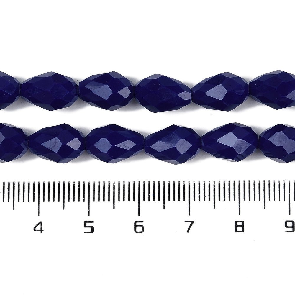 Dråbeformede Glasperler – Opaque Midnatsblå, Facetterede (8x6mm), 51 cm. - Uniq Perler - 125795