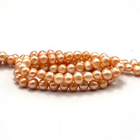 Gefärbte Süßwasserperlen, Hellorange/Pfirsich, 5 - 6mm - Uniq Perler - 832578