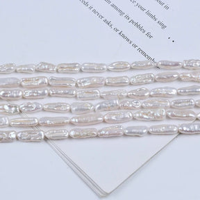 Süßwasserperlen – Biwa Barock, Grade AA (20x6–10mm) - Uniq Perler - 1111490461