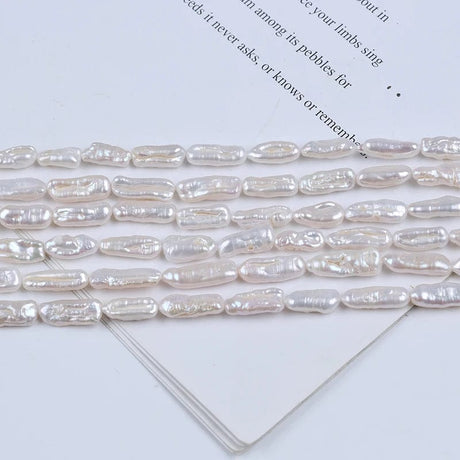 Ferskvandsperler – Biwa Barok, Grade AA (20x6–10mm) - Uniq Perler - 1111490461