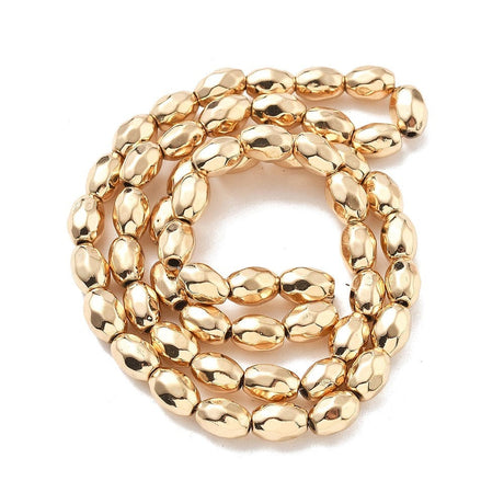 Forgyldt Hæmatit – Facetteret, Oval (4x7mm) - Uniq Perler - 114697