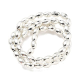 Forsølvet Hæmatit – Facetteret, Oval (4x7mm) - Uniq Perler - 114696