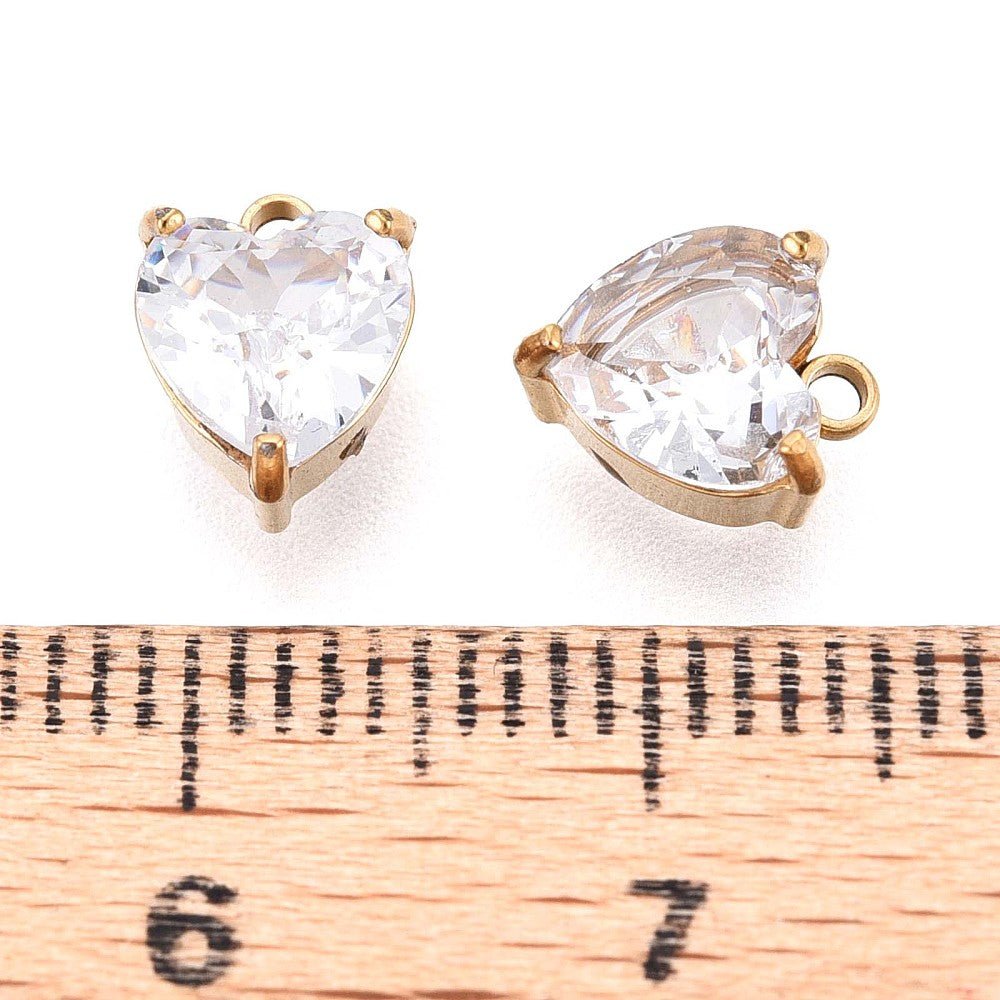 Glashjerte Vedhæng – Facetteret, Vandfast stål (8x6mm, Klar/Gylden) 2 stk. - Uniq Perler - 