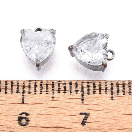 Glashjerte Vedhæng – Facetteret, Vandfast stål (8x6mm, Klar/Stål)2 stk. - Uniq Perler - 