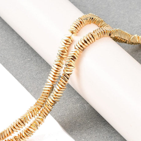 Hæmatit – Forgyldt, Tvistet Kant, Facetteret (3x3x1mm) - Uniq Perler - 113193