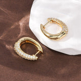 Ovale creol øreringe med zirkonia – 18K forgyldt - Uniq Perler - 