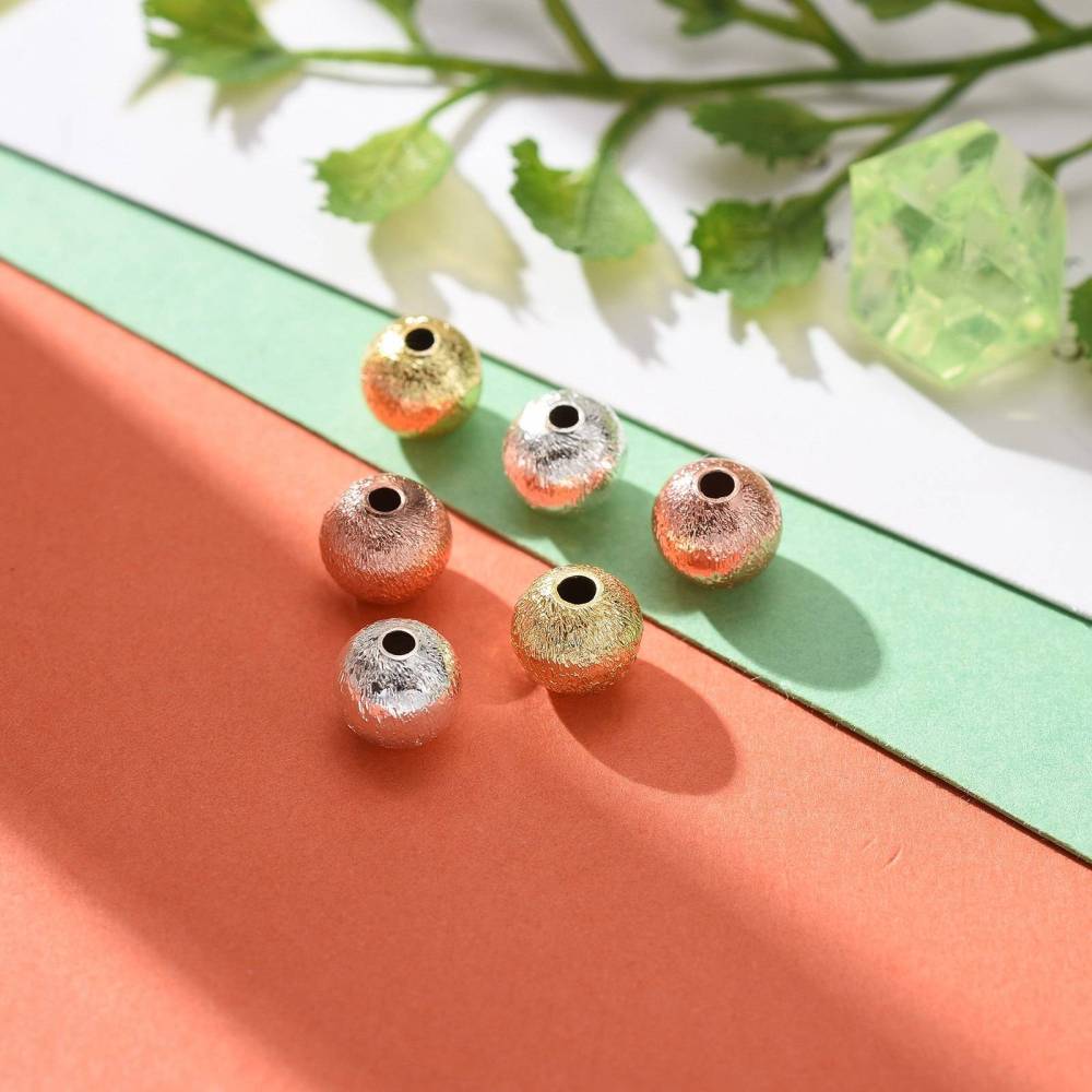 Pakke Med Belagte Messing Perler, 6x5,5mm, 30 stk - Uniq Perler - 113234