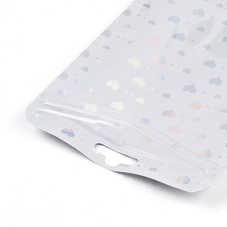 Plastikposer Med Lynlås, Hvid Med Hjerter, (10x15cm, 25 stk.) - Uniq Perler - 114964