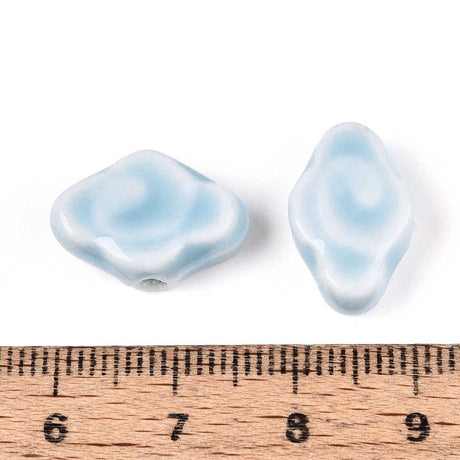 Porcelænsperler –Glaseret, Lyseblå (10 - 12x16x6mm) 4 stk. - Uniq Perler - 122764
