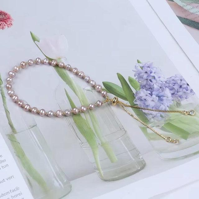 Regulerbar Armbånd med Ferskvandsperler, rosa Nuancer - Uniq Perler - 514433