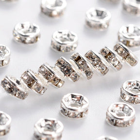 Rondellen mit klarem Stein - versilbert (4x2mm, 20 Stück) - Uniq Perler - 291843