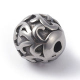 Runde Perler i Stål – Blomster Mønster, Antik Forsølvet (9,5mm) - Uniq Perler - 116007