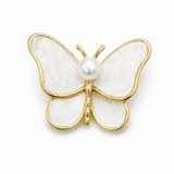 Shell broche med forgyldte detaljer – håndlavet (32mm) - Uniq Perler - 122273