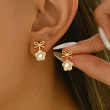 Sløjfe Ørestikkere Med Klare Zirkonia Sten Og Perle - Uniq Perler - 114230