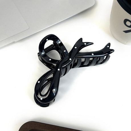 Sløjfeformet Hårklemme Af Sort Plast - Uniq Perler - 115521