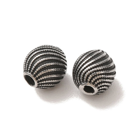 Stål Perler – Oval Med Spiralmønster (8x9mm) 1 stk. - Uniq Perler - 124309