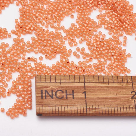 TOHO Seed Beads – TR 2112, Silver Lined Milky Grapefruit (11/0) - Uniq Perler - 119136