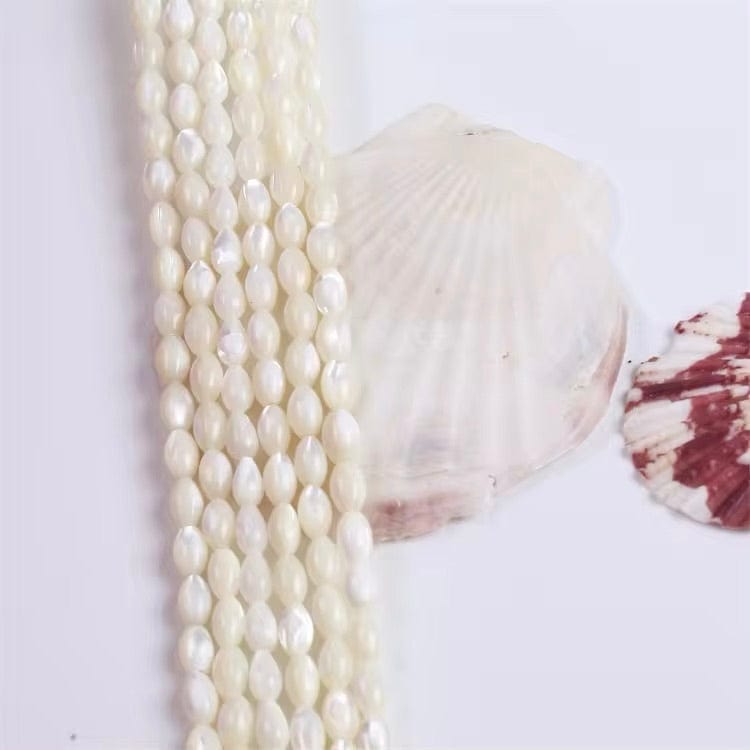 Trochus Shell Perler, Hvid, Rice, 6x9mm - Uniq Perler - 112067