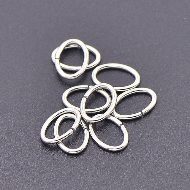 Vandfaste Øskner – Åbne, Ovale, Stål (9,6x6,5mm) 20 stk. - Uniq Perler - 126377