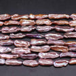 AL Ferskvandsperler Rosa Biwa Barok perler, aflange 9x18 mm