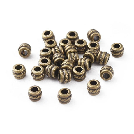 Uniq Perler Metal perler 20 stk antik bronze perle med lille mønster str. 5x4 mm