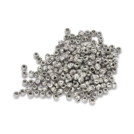 Uniq Perler Metal perler Lille perler med tvistet mønster, 3x2 mm, 10 stk.