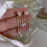 Uniq Perler ørestikkere Forgyldt sterling sølv ørestikker med vedhæng/topboret perler