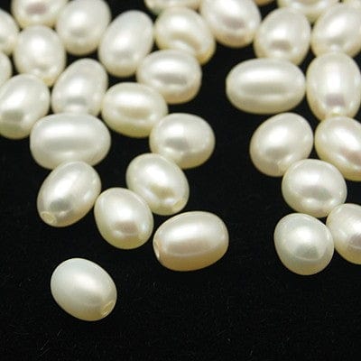 Uniq Perler Top/anboret perler. Ferskvandsperler top/anboret str. 6-8 mm
