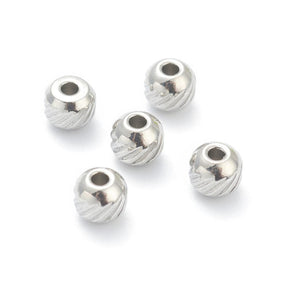 Vattentåliga Stålpärlor med mönster, 4x3,5mm, (10 st) - Uniq Perler - 0000007111